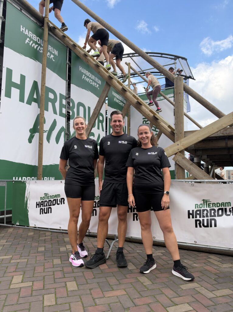 three persons in black sports clothing